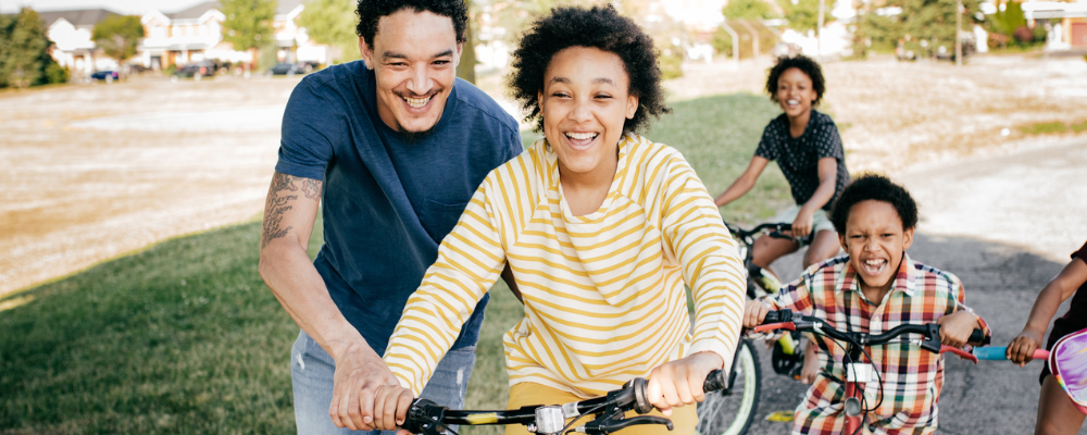 Family riding bikes