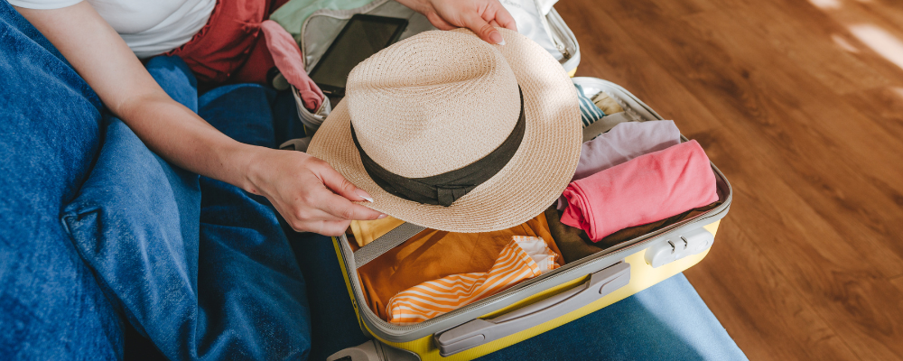 Packing hat in suitcase