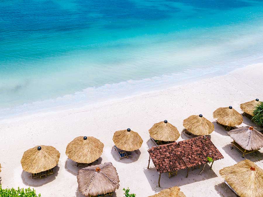 Pristine beach in Bali with white sand and turqoise water