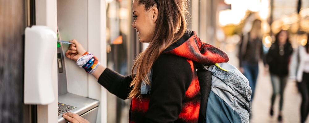 Woman using a cash machine
