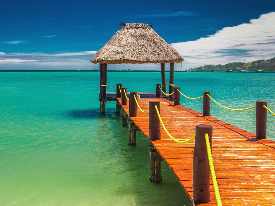 Hut and dock in the ocean 