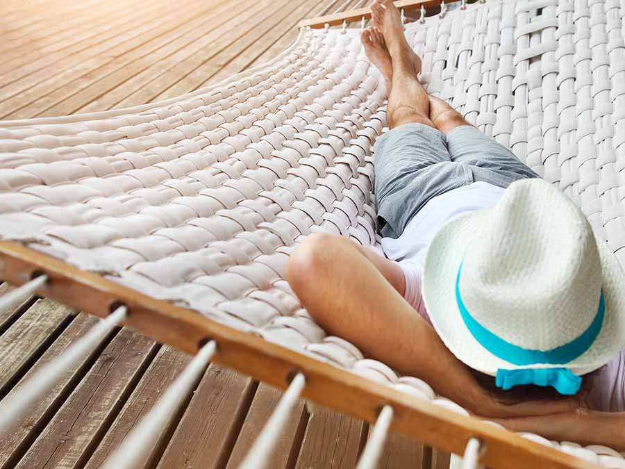 Man relaxing on a hammock