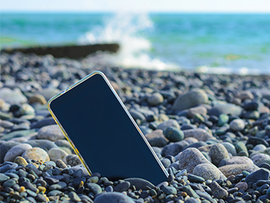 Phone left on the beach