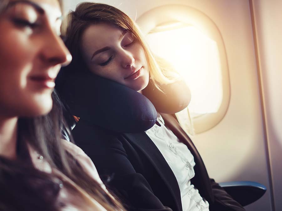 Woman sleeping in the plane