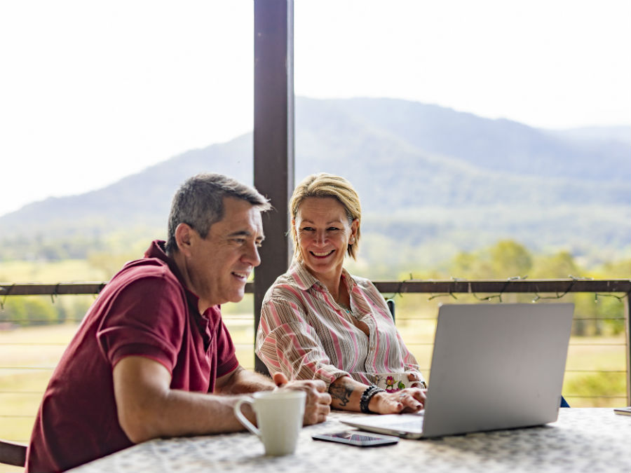 Couple looking at laptop